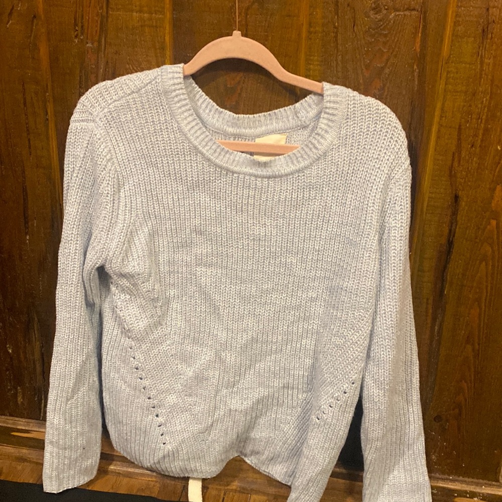 Womens size small crewneck with back tie detail.